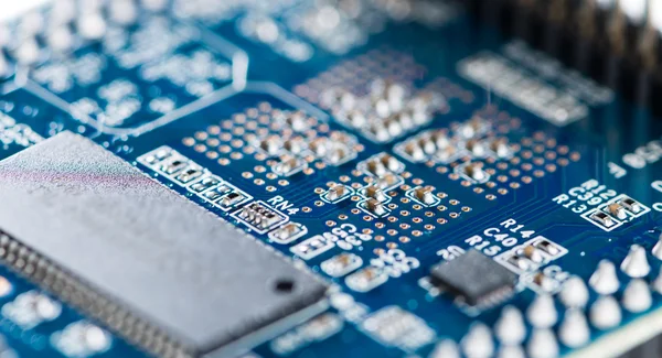 Blue PCB with SMD components — Stock Photo, Image