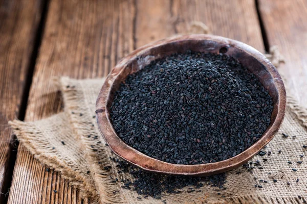 Jakieś czarne nasiona sezamu — Zdjęcie stockowe