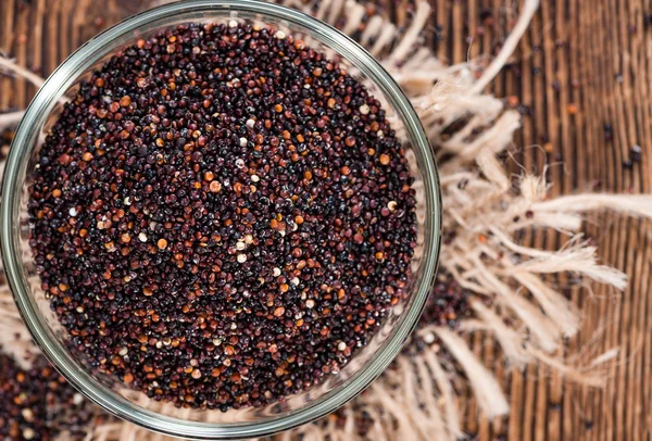 Portion of uncooked black Quinoa — Stock Photo, Image