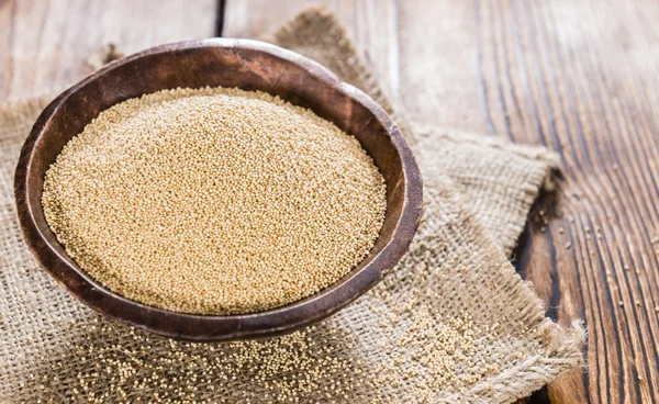 Amaranth on wooden background — Stock Photo, Image