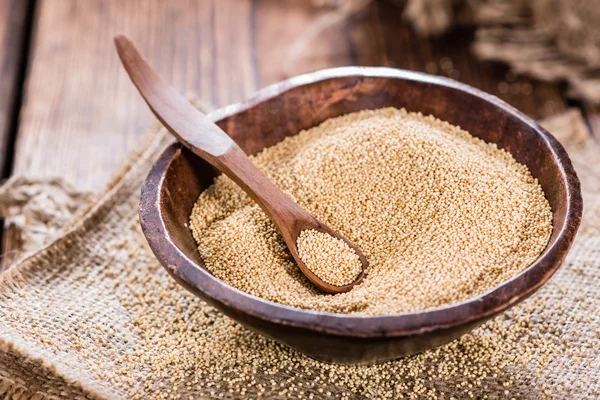 Amaranth on wooden background — Stock Photo, Image