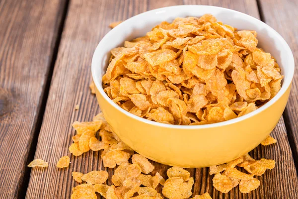 Goldene Cornflakes in Schale — Stockfoto