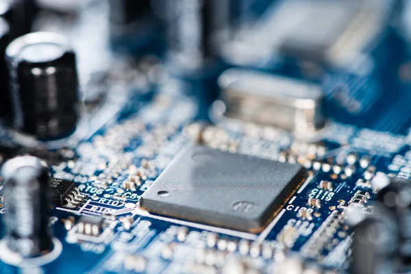 Chips on a blue PCB — Stock Photo, Image