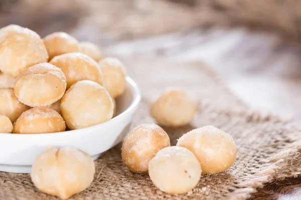 Porción de nueces de macadamia —  Fotos de Stock