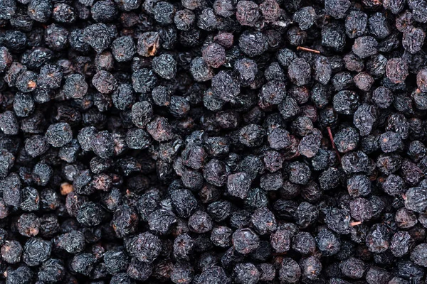 Hög med Chokeberries som bakgrund — Stockfoto