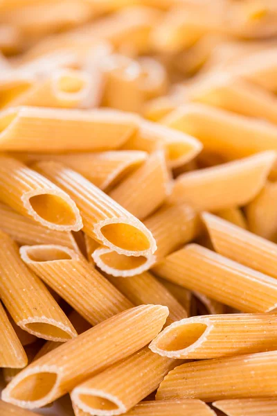 Fullkorn Penne bakgrund — Stockfoto