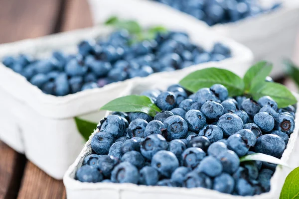 Portionen frische Blaubeeren — Stockfoto