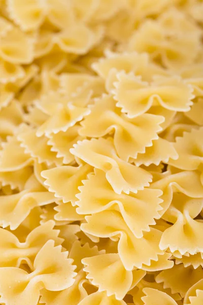 Raw Farfalle as Background — Stock Photo, Image