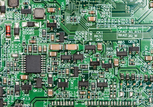 PCB com componentes eletrônicos — Fotografia de Stock