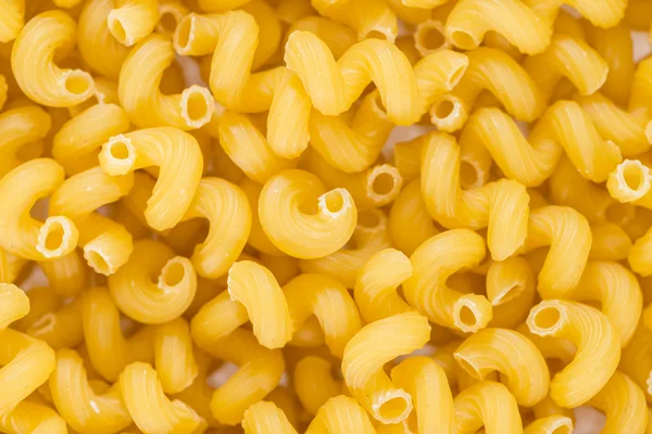 Pasta rizos fondo imagen — Foto de Stock