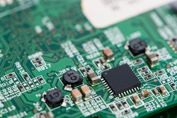 PCB  with a lot of electrical components — Stock Photo, Image