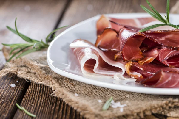 Portion of Sliced Ham in white plate — Stock Photo, Image