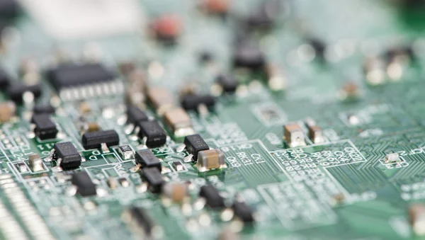PCB  with a lot of electrical components — Stock Photo, Image