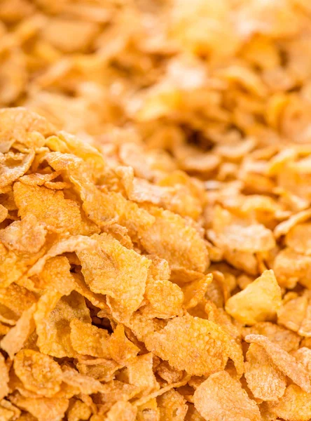 Gelbe Cornflakes als Hintergrund — Stockfoto