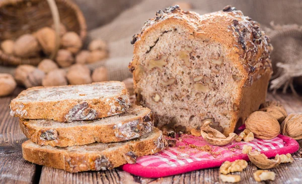 Half sliced welnut bread — Stock Photo, Image