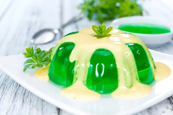 Portion of Woodruff Jelly with Vanilla Sauce — Stock Photo, Image