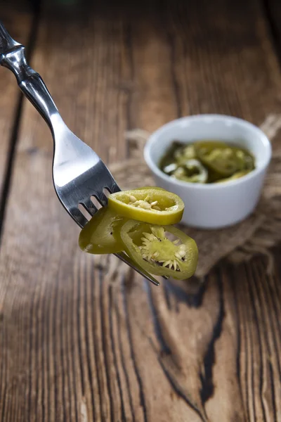 Sliced Jalapenos in white plate — Stock Photo, Image