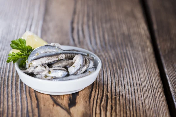 Anchovas em conserva na placa — Fotografia de Stock