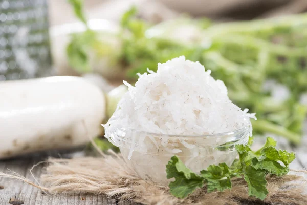 Fresh grated Horseradish in bowl — Stock Photo, Image