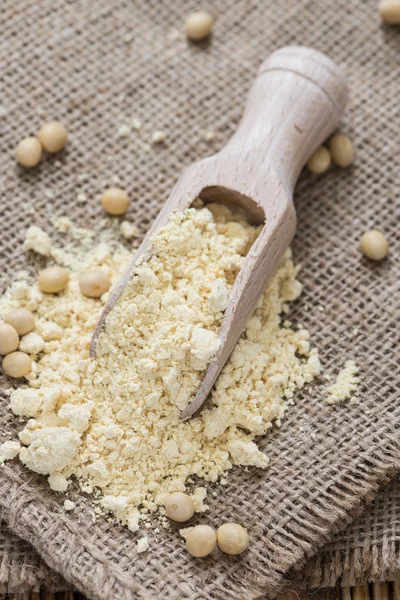 Portion of Soy Flour on wooden spoon — Stock Photo, Image