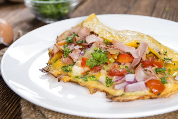 Fresh made Omelette  on plate — Stock Photo, Image