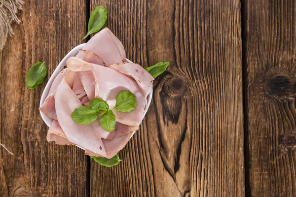 Jamón en cuenco sobre madera — Foto de Stock