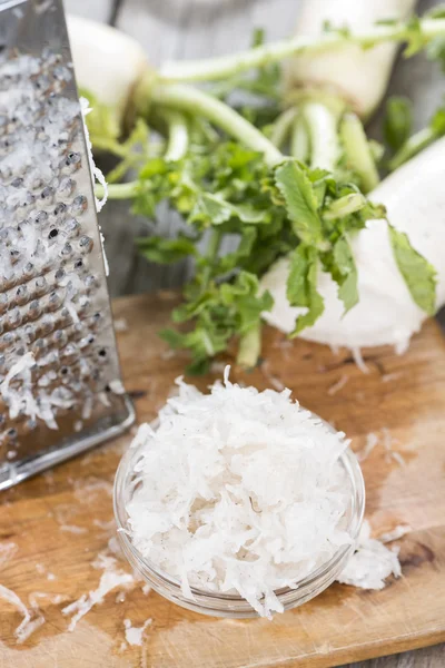 Fresh grated Horseradish in bowl — Stock Photo, Image