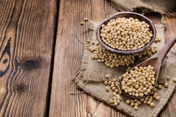 Soy Beans on wood — Stockfoto