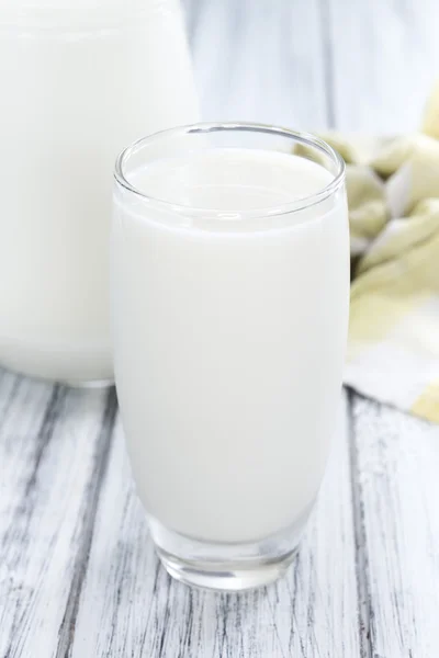 Glass of Milk on wood — Stock fotografie