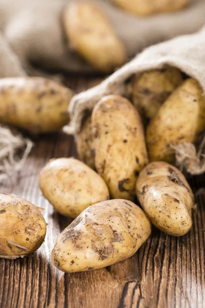 Portion of Potatoes on table — Stock Photo, Image