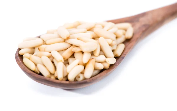 Heap of fresh Pine Nuts over white — Stock Photo, Image