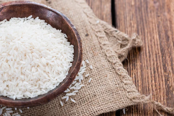 Portion of Rice on rustic background — Stok fotoğraf