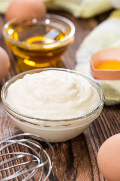 Portion of Mayonnaise on wooden background — Stock Photo, Image