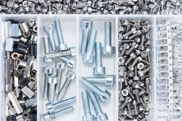 Screws and Machine Parts in a box — Stock Photo, Image