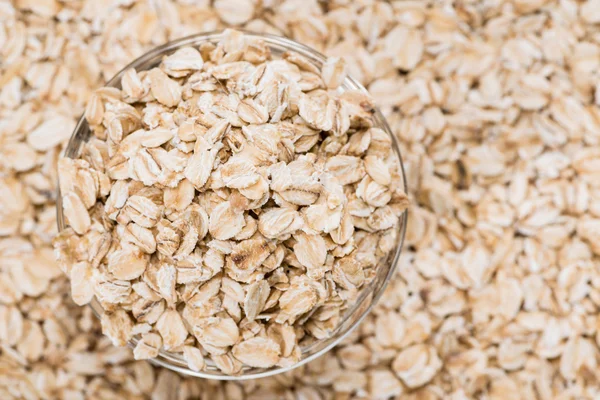 Oatmeal Background in glass — Stock Photo, Image