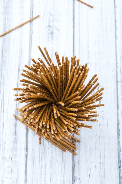 Salt Sticks on an old wooden table — Stockfoto