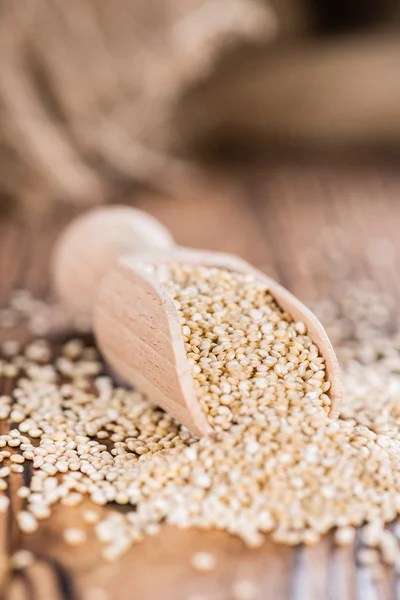 Portion of Quinoa on a wooden spoon — Stock Photo, Image