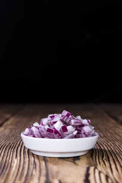 Porción de cebollas rojas cortadas en cubitos —  Fotos de Stock