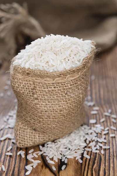 Saco pequeno com arroz — Fotografia de Stock