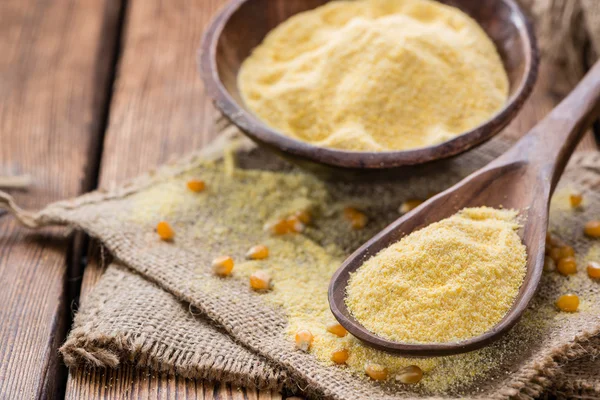 Cornmeal (on rustic background) — Stock Photo, Image