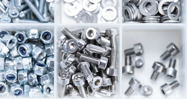 Screws and Machine Parts in a box — Stock Photo, Image