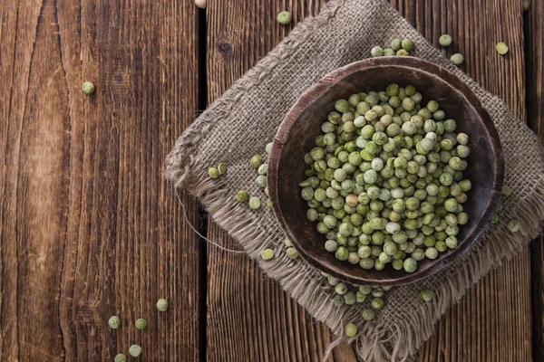 Hoop van gedroogde groene erwten — Stockfoto