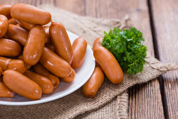Small Sausages on wood — Stock Photo, Image