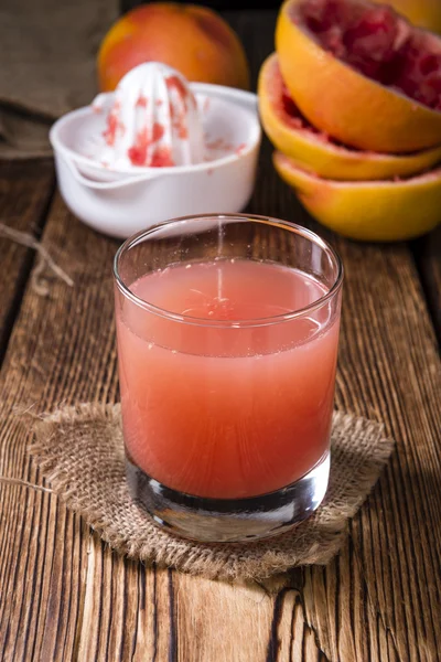 Succo di pompelmo puro — Foto Stock