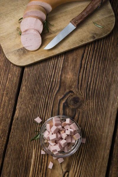 Portion of Baloney and knife — Stock Photo, Image