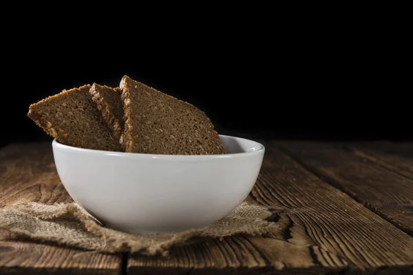 Kahverengi ekmek bir dilim — Stok fotoğraf