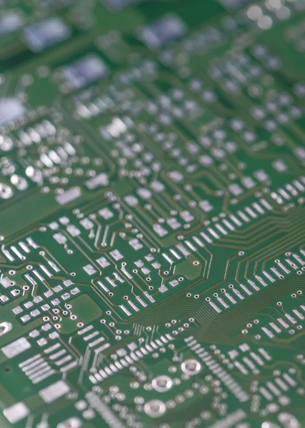 PCB com diferentes circuitos eletrônicos — Fotografia de Stock