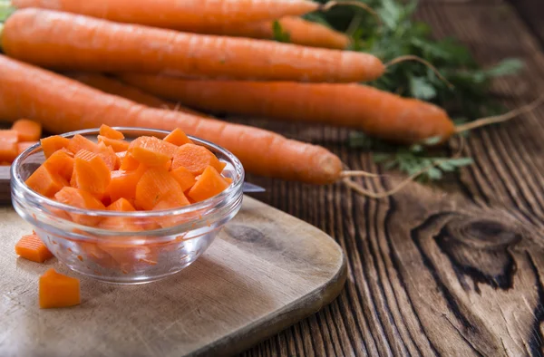 Bowl with diced carrots — Stock Photo, Image