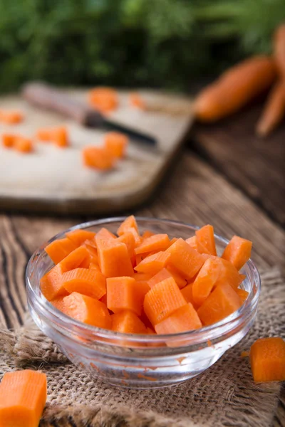 Bowl with diced carrots — Stock Photo, Image