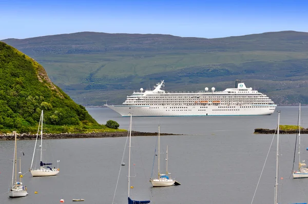 Cruise liner Crystal Symphony in Portree harbor.
